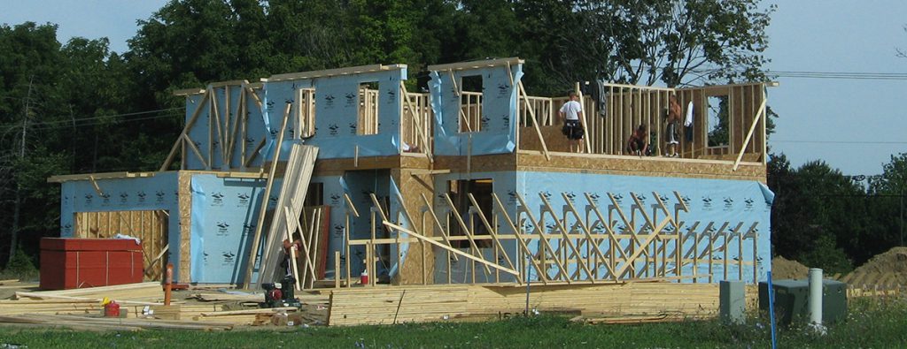 A home under construction during the framing stage.