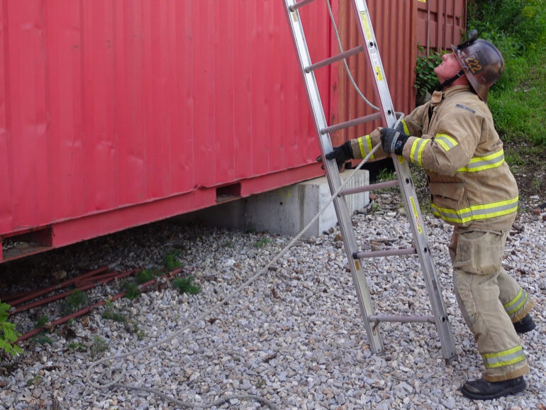 Rolling a ladder into position